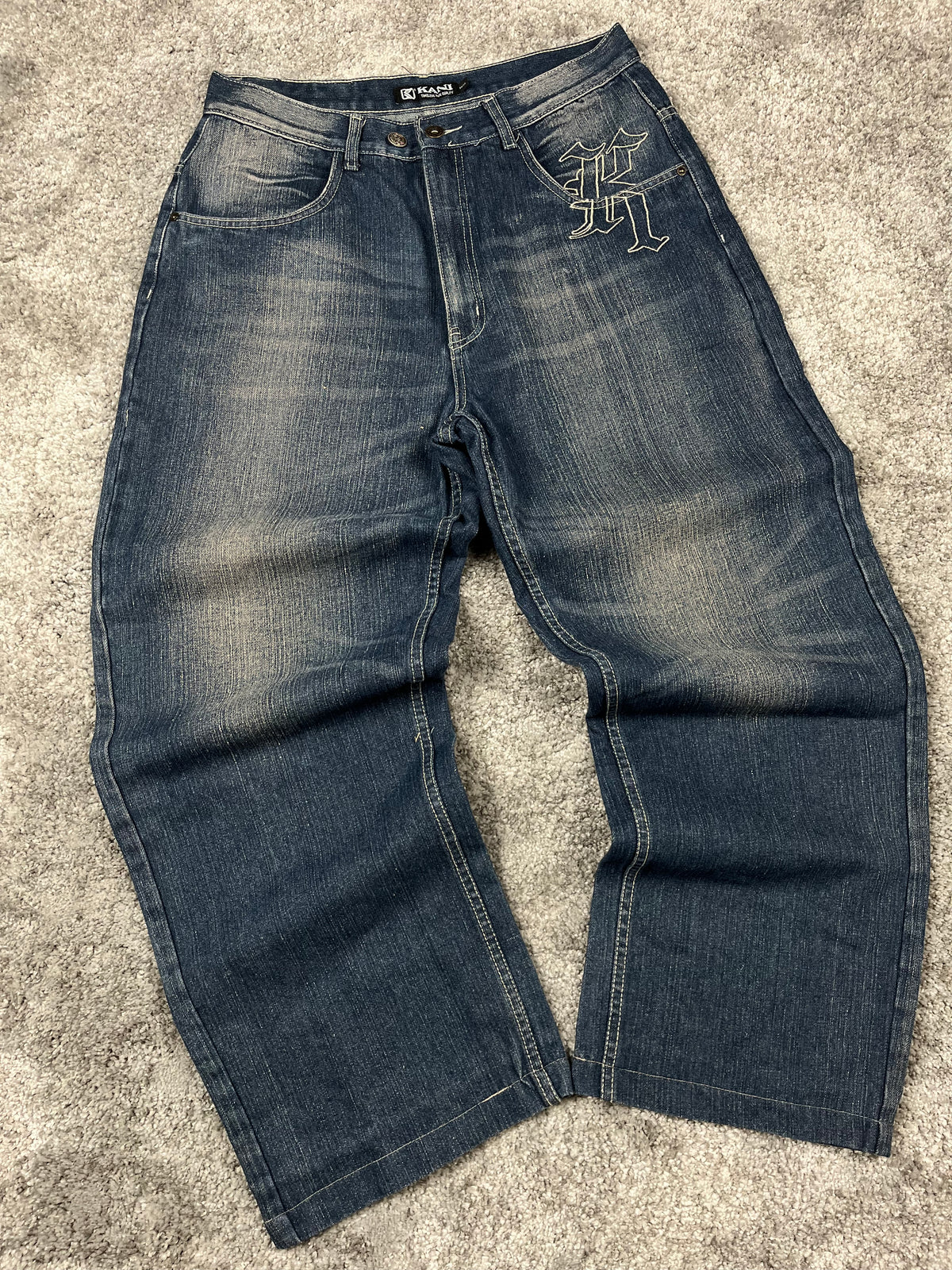 Jeans baggy estilo Y2K de Karl Kani, moda urbana, hechos en EE. UU., mezclilla lavada azul oscuro, estampado (talla 44)