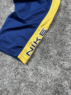 Pantalon de survêtement Nike vintage années 2000 "Bleu marine/Jaune" (L)