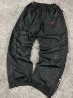 Pantalón de chándal Nike vintage poco común de los años 2000 "Negro/Rojo" (L)