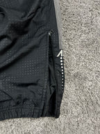Pantalón de chándal Nike vintage poco común de los años 2000 "Negro/Rojo" (L)