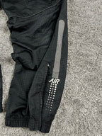 Pantalón de chándal Nike vintage poco común de los años 2000 "Negro/Rojo" (L)