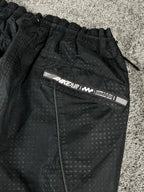 Pantalón de chándal Nike vintage poco común de los años 2000 "Negro/Rojo" (L)